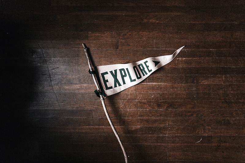 Photo of a flag with Explore written on it